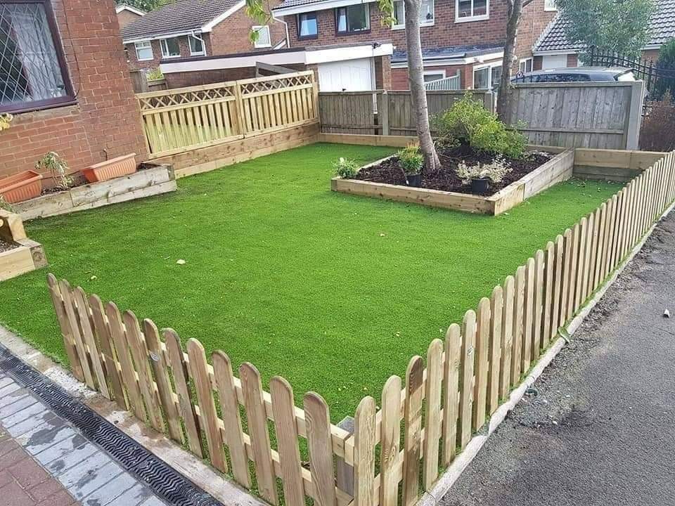 Artificial Grass with block paving driveway and new fencing