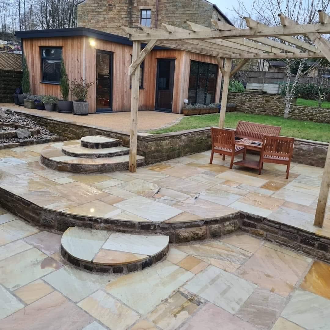 Complete renovation with garden pod, resin bound gravel, Indian paving, water fall and newly laid turf